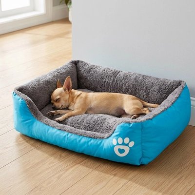 Panier chien bleu chien dort confortablement
